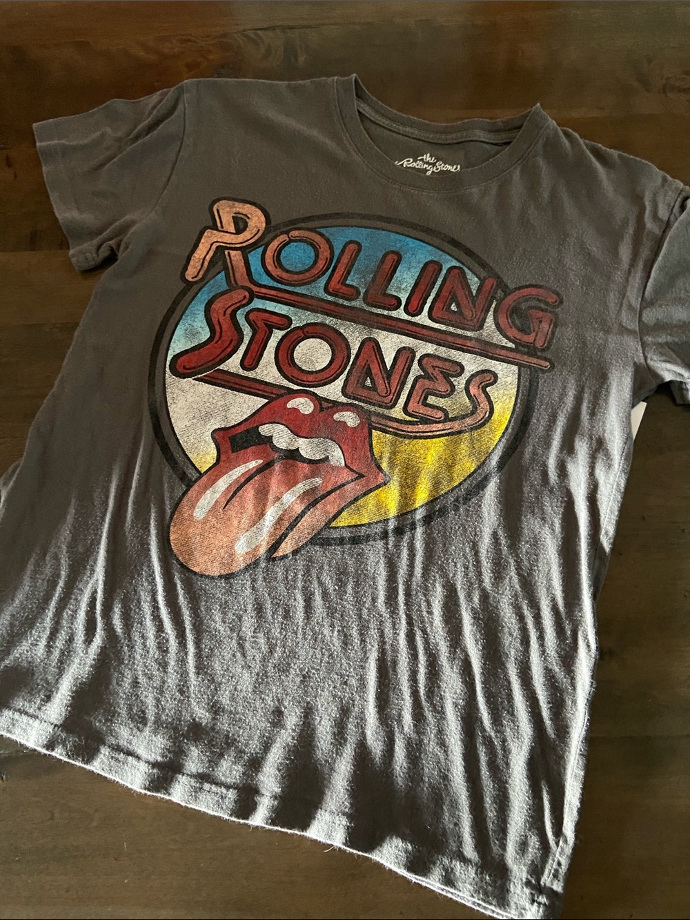 the Rolling Stones Women’s Short Sleeve Tee in Charcoal with Multicolor Logo